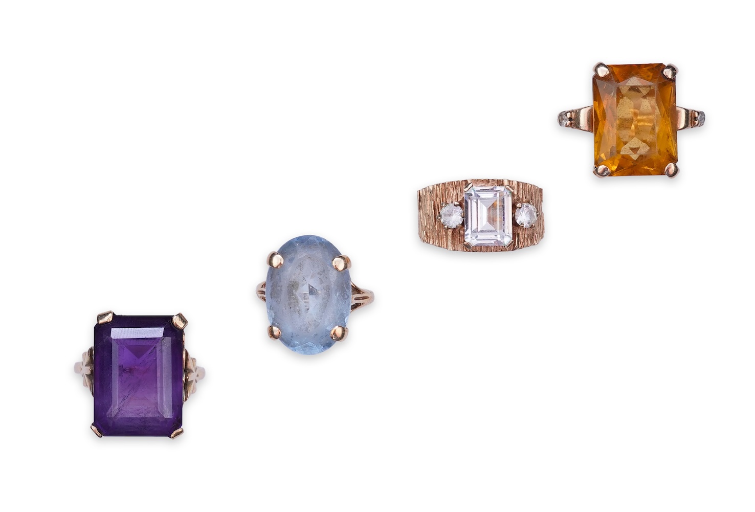 Four gem-set rings